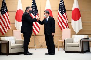 Secretary of State Pompeo bumps fists with Japanese Prime Minister Suga