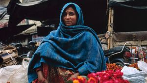 Woman selling flowers in India