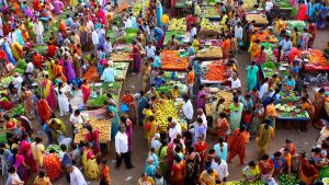A crowded food market in an Indian city,