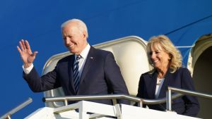 President Biden and First Lady Dr. Jill Biden step off a plane