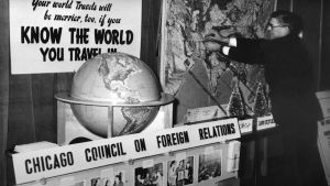 Black and white photo of a globe with Chicago Council on Foreign Relations signage