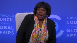 Screenshot of Ertharin Cousin speaking at a Council event in front of a blue screen.
