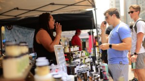 Shoppers and vendors at Sundays on State