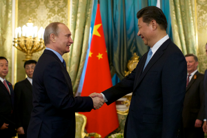 Vladimir Putin shakes hands with Xi Jinping in the Kremlin on May 8, 2015.