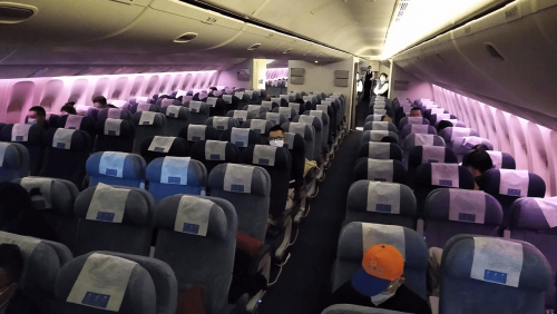 A nearly empty flight from Beijing to LA amid the COVID-19 pandemic