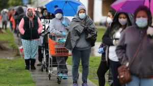 People queue to pick up fresh food at a Los Angeles Regional Food Bank, as the spread of the coronavirus disease (COVID-19) continues