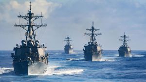 Four US Navy ships sailing in open water