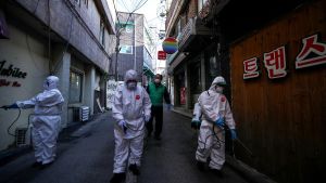 Cleaning workers disinfect the streets and public places of the Itaewon Multicultural District in Seoul, South Korea
