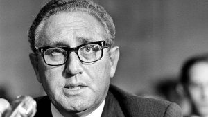 Henry Kissinger testifies during his confirmation hearings