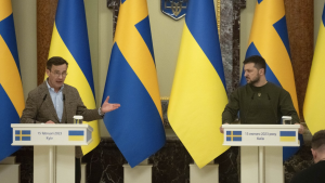 Ukrainian President Volodymyr Zelenskyy, right, and Swedish Prime Minister Ulf Kristersson attend a joint news conference in Kyiv